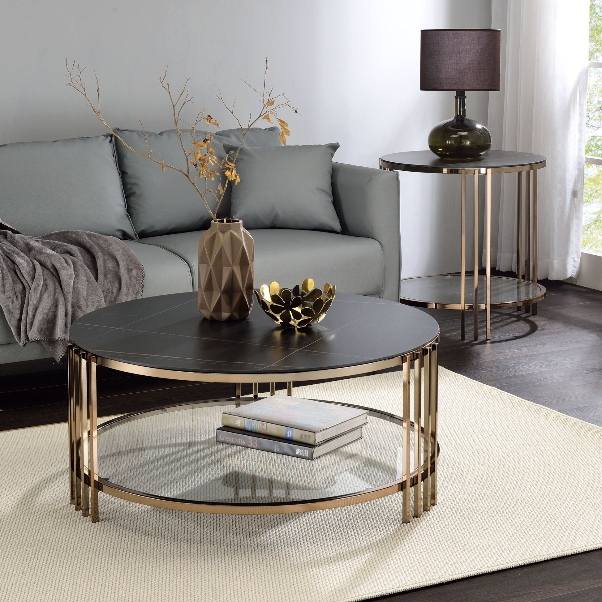 Abisha Sintered Stone Top & Champagne Finish Round Coffee Table - 1st Choice Furniture Direct