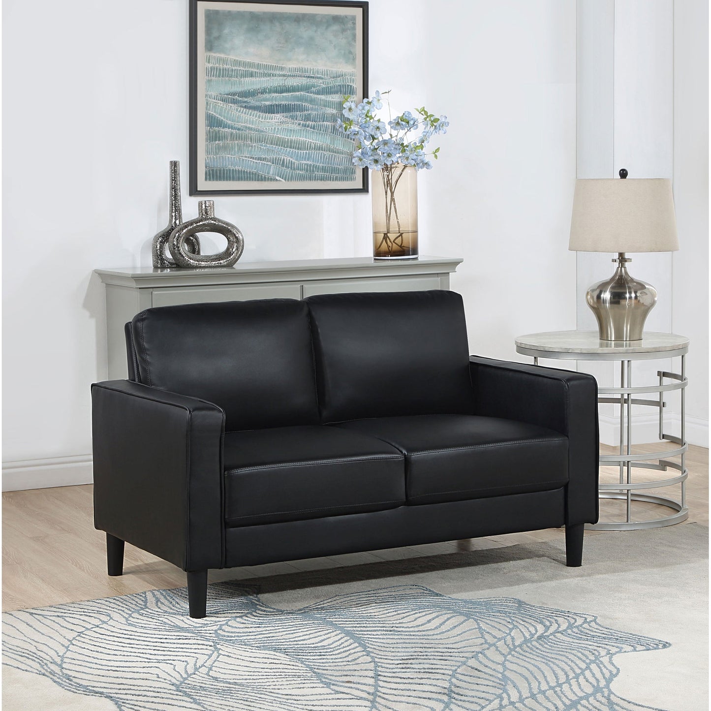 Farallone Black Upholstered Track Arm Loveseat with Smooth Faux Leather, Tapered Feet, and Modern Design - 1st Choice Furniture Direct