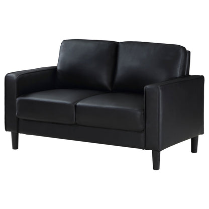 Farallone Black Upholstered Track Arm Loveseat with Smooth Faux Leather, Tapered Feet, and Modern Design - 1st Choice Furniture Direct