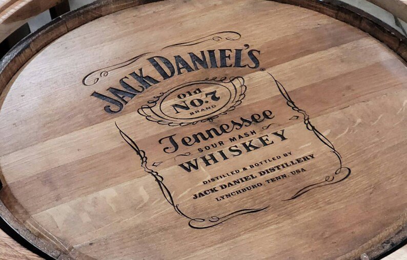 Jack Daniel's Whiskey Barrel Table, Reclaimed Barn Wood Top, Metal Footrest - 1st Choice Furniture Direct