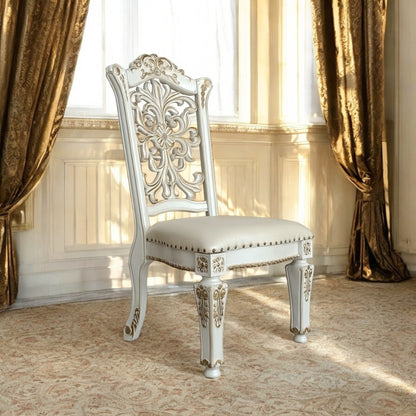 Set of 2 Antique White Faux Leather Dining Chairs with Floral Carved Back - 1st Choice Furniture Direct
